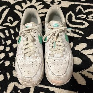 Women’s Nike air forces size 9 with teal logo Very worn